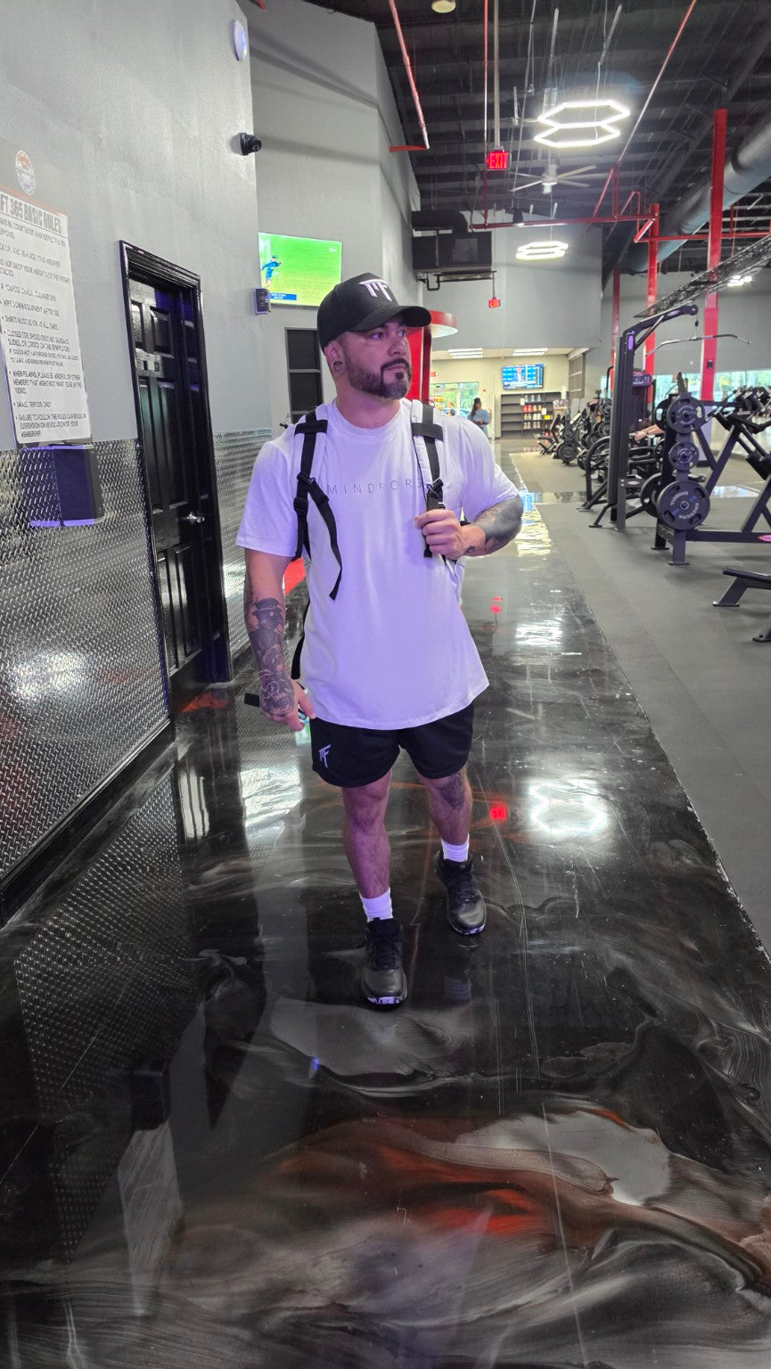 MindForge Essential Tee styled with MF training shorts in gym